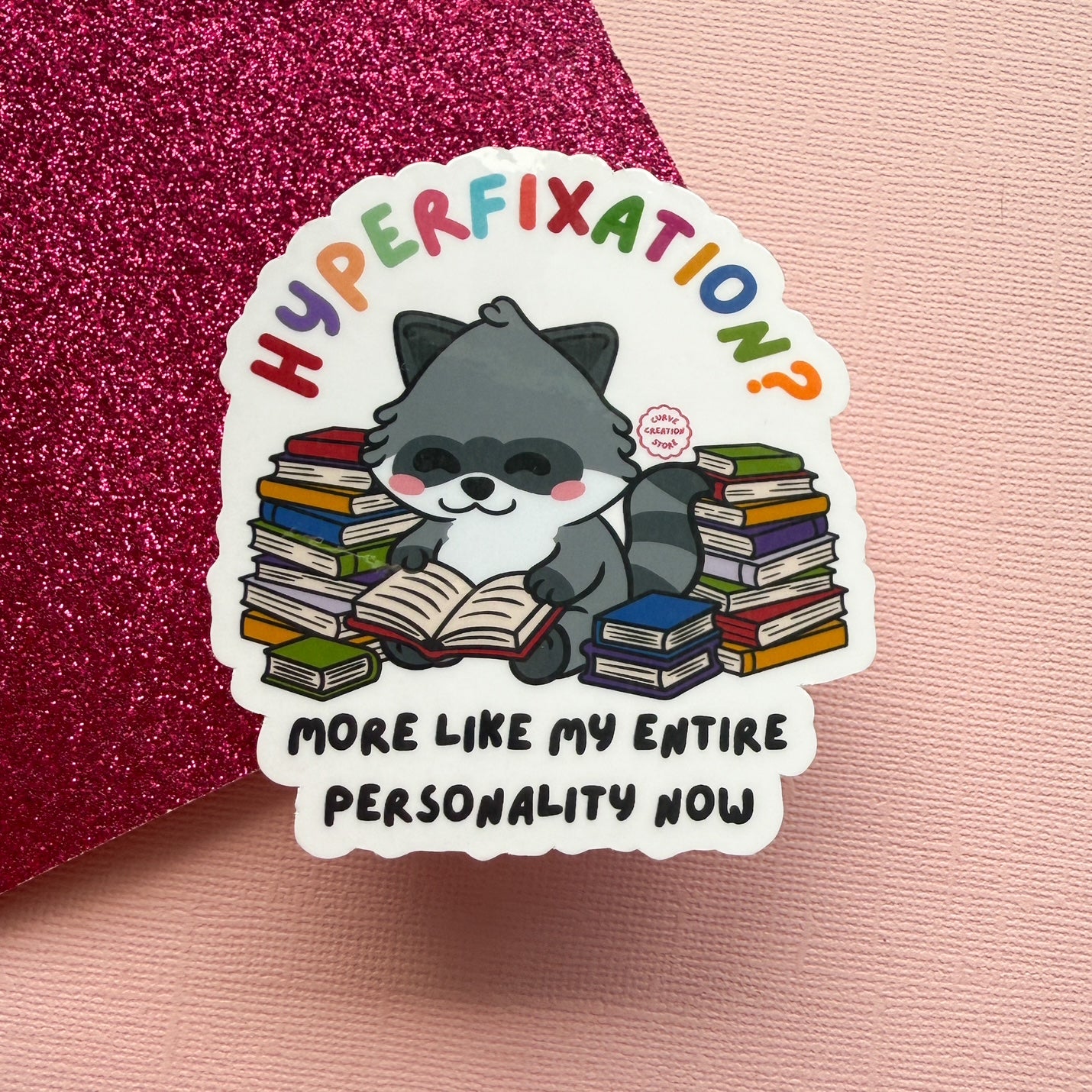 Reading Hyper fixation Neurodivergent Raccoon Sticker